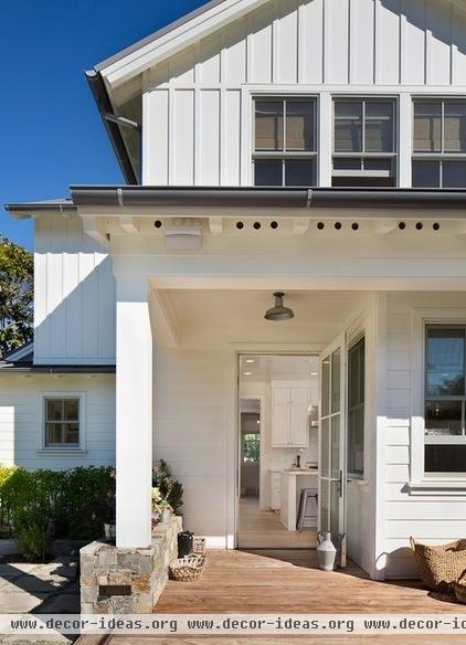 farmhouse porch by Simpson Design Group Architects