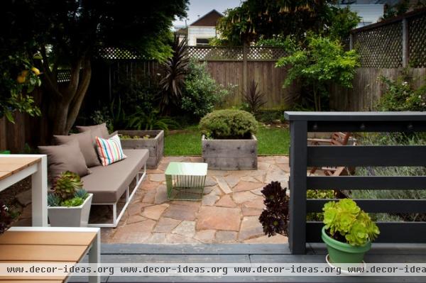 eclectic patio by Margot Hartford Photography