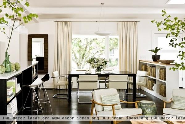 midcentury dining room by The Works