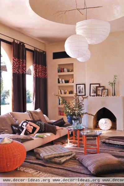 mediterranean living room by Artisan Books