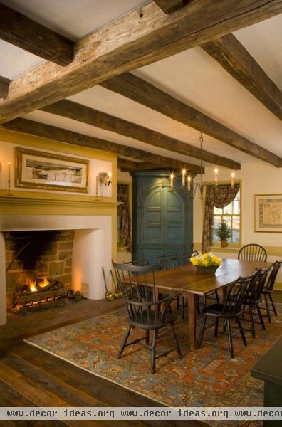 rustic dining room by Archer & Buchanan Architecture, Ltd.