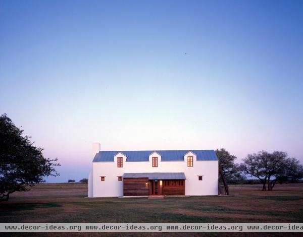 rustic exterior by Michael G Imber, Architects