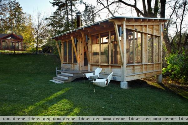 eclectic porch by M Valdes Architects PLLC