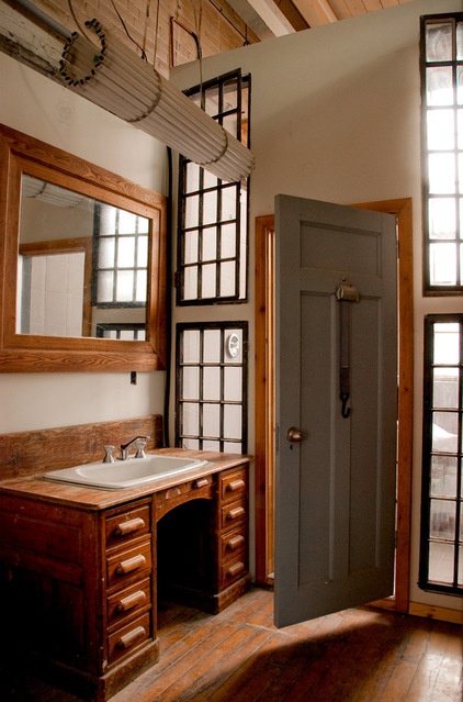 rustic bathroom by Lucid Interior Design Inc.