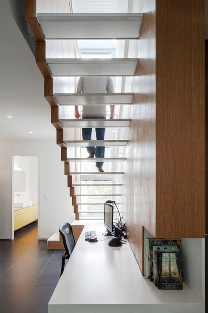 modern staircase by arbejazz architects studio ltd.