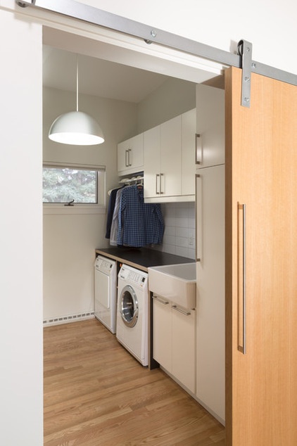 midcentury laundry room by Design Platform