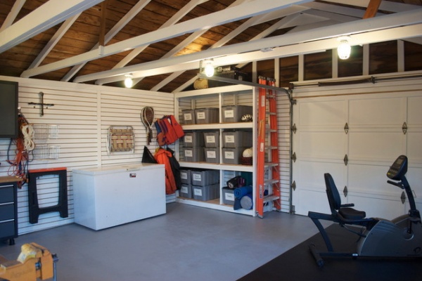 eclectic garage and shed by The Design Den Homes Inc.