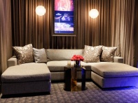 Sectional Sofa Seating in a Home Theater with Globe Pendant LIghts : Designers' Portfolio