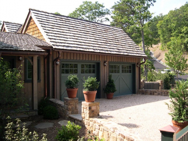 traditional garage and shed by McKEE CARSON