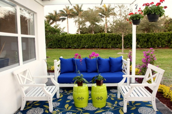 beach style patio by Interiors by Maite Granda