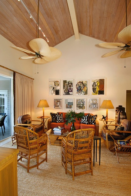 tropical living room by GIL WALSH INTERIORS