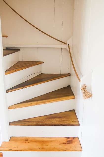 beach style staircase by allee architecture + design, llc