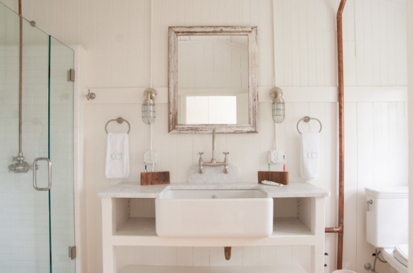 beach style bathroom by allee architecture + design, llc