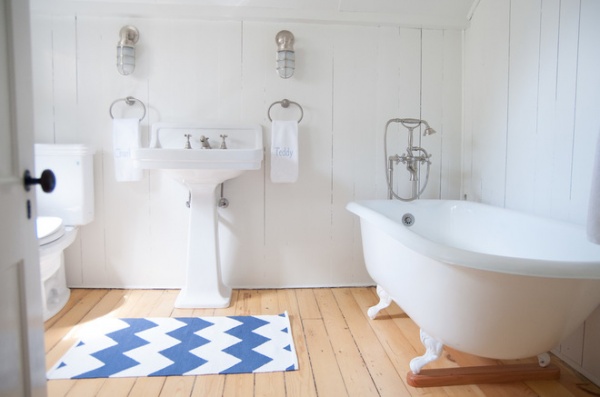 beach style bathroom by allee architecture + design, llc