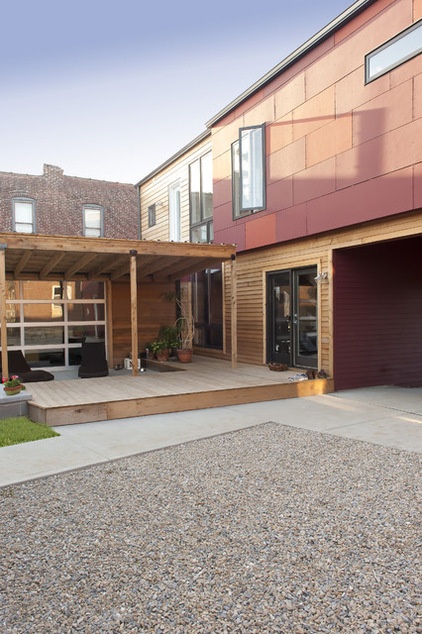 contemporary exterior by Urban Improvement Company