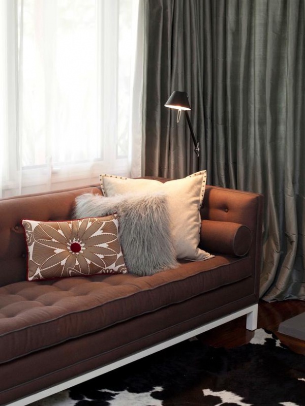 Brown Tufted Sofa and Cow Hide Rug in Reading Nook : Designers' Portfolio