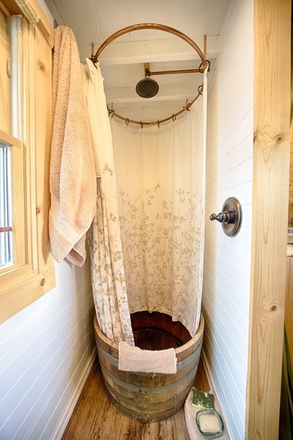 rustic bathroom by The Tiny Tack House