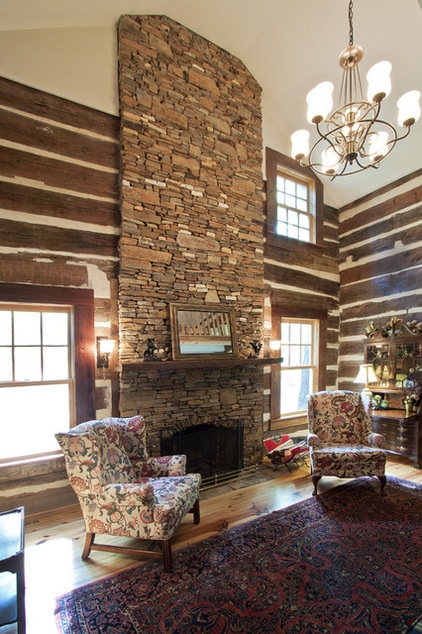 rustic family room by Clark & Zook Architects, LLC