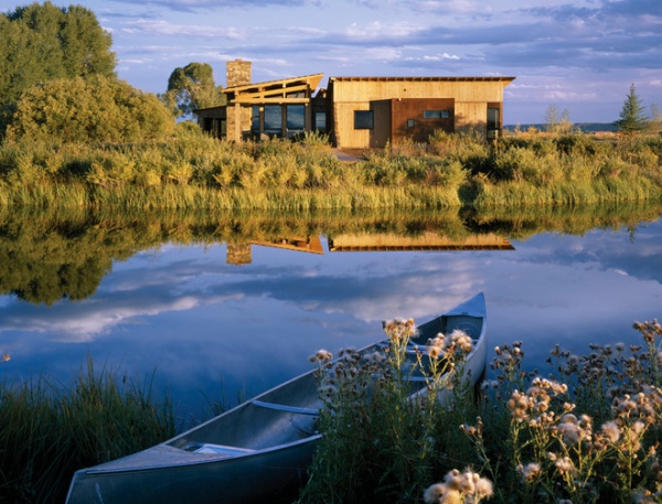 rustic exterior by Carney Logan Burke Architects