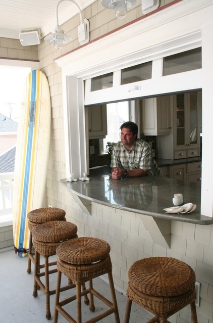 beach style porch by Rice and Brown Architects