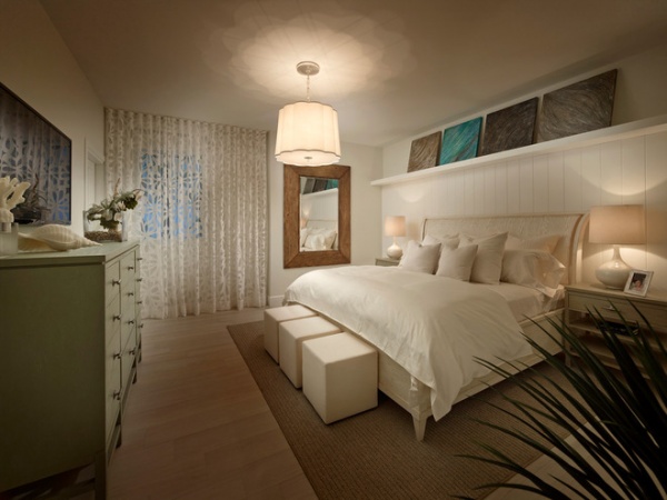 beach style bedroom by Interiors by Steven G