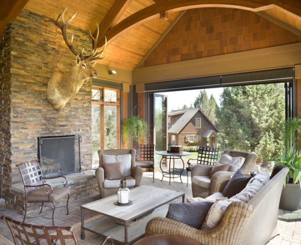 rustic porch by Alan Mascord Design Associates Inc