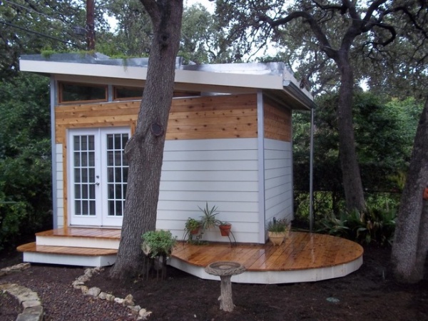 contemporary garage and shed by Purple Fountain Tree