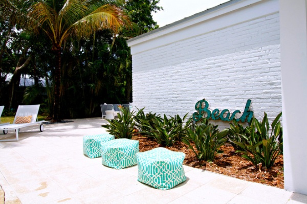 Beach Style Exterior by Mina Brinkey