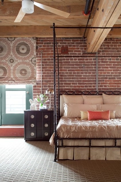 Industrial Bedroom by laurel quint interior design