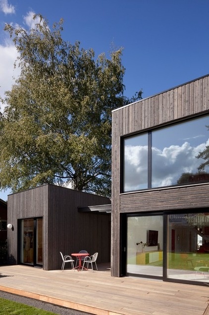 Midcentury Exterior by In Situ Architecture