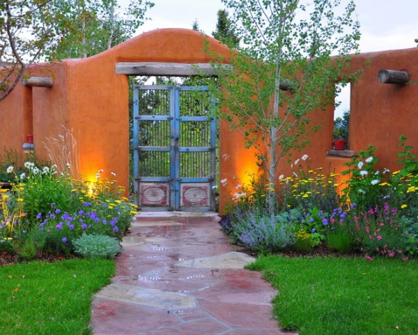 Mediterranean Landscape by Designscapes Colorado Inc.