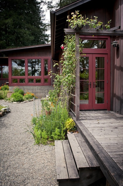 Rustic Exterior by 450 Architects, Inc.