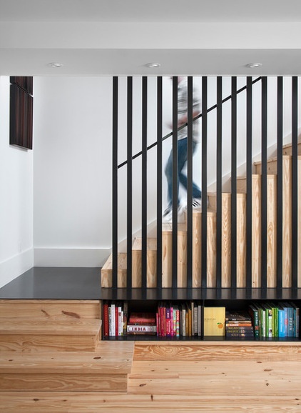 Contemporary Staircase by Texas Construction Company