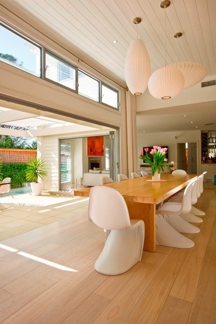 Contemporary Dining Room by Sanctum Design