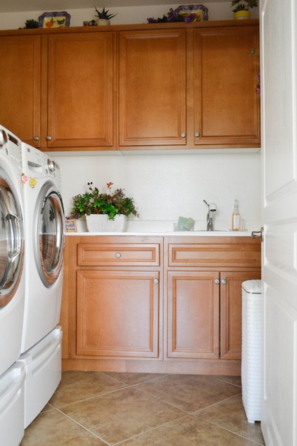 Mediterranean Laundry Room by Planning Pretty