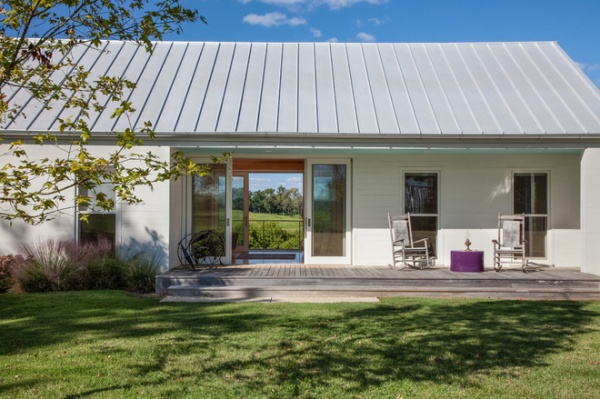 Farmhouse Exterior by HS2 Architecture