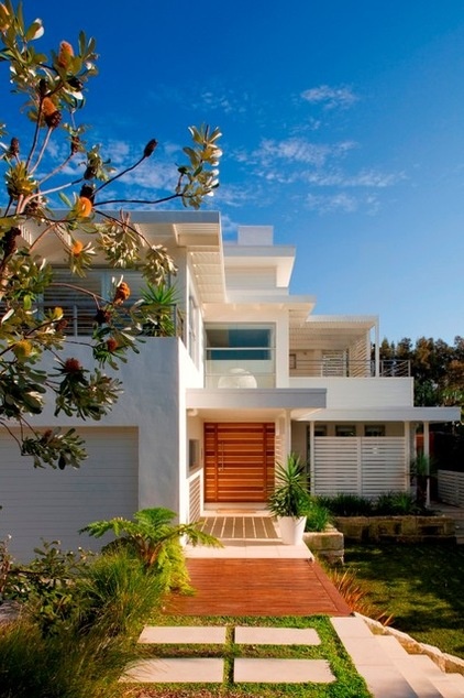 Contemporary Exterior by Sanctum Design