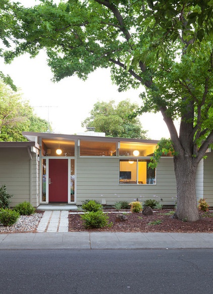 Midcentury Exterior by Klopf Architecture