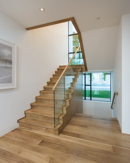 Midcentury Staircase by Building Solutions and Design, Inc