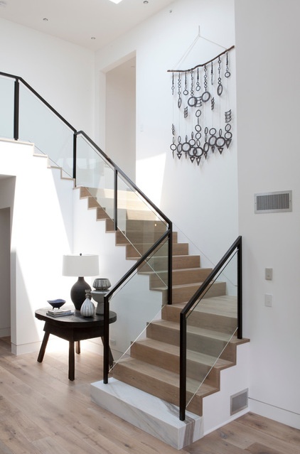 Beach Style Staircase by DISC Interiors