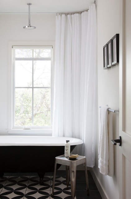 Farmhouse Bathroom by Texas Construction Company