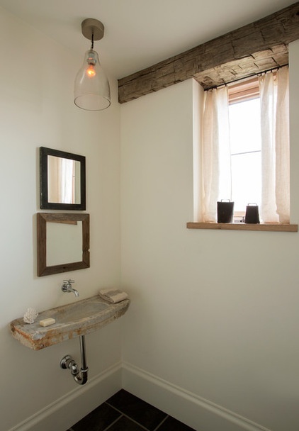 Farmhouse Powder Room by Holmes Hole Builders LLC