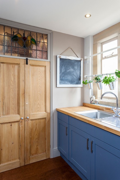 Farmhouse Laundry Room by Chris Snook