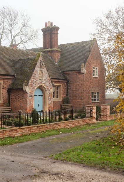 Farmhouse Exterior by Chris Snook