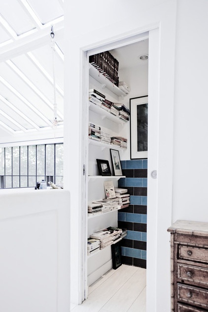 Contemporary Powder Room by Miriam Gassmann