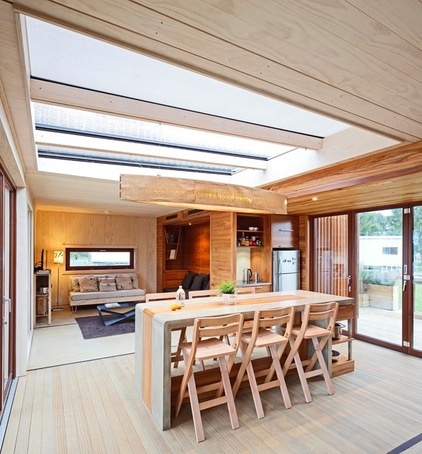 Beach Style Dining Room by First Light Studio