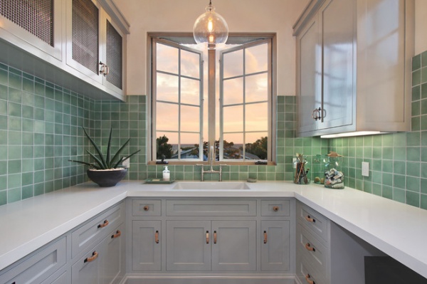 Mediterranean Laundry Room by Jeri Koegel Photography