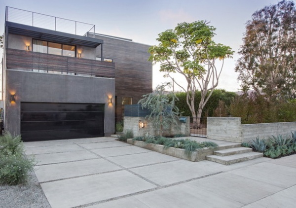 Contemporary Exterior by Shelby Wood Design