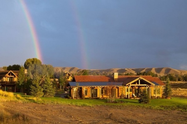 Rustic Exterior by Carter Kay Interiors