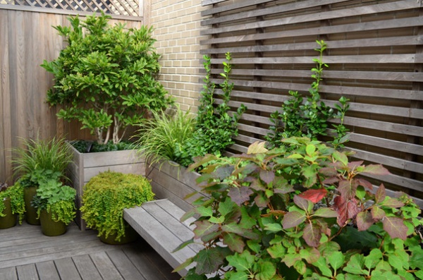 Traditional Porch by Jeffrey Erb Landscape Design